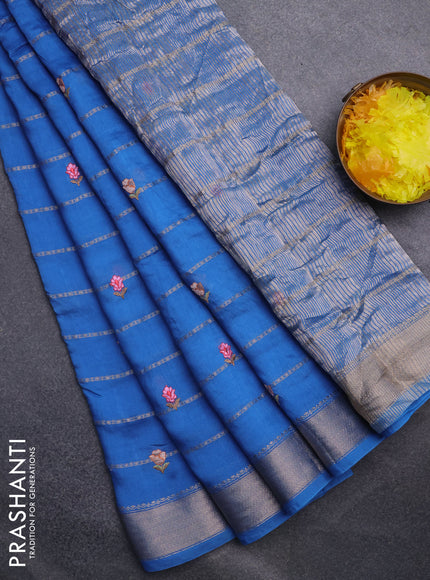 Assam silk saree cs blue with allover zari weaves & embroidery work buttas and zari woven border