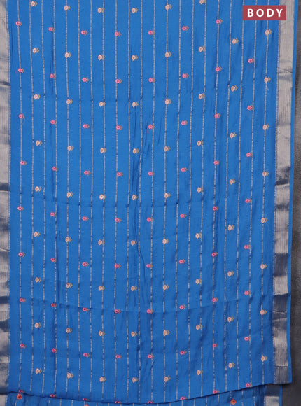 Assam silk saree cs blue with allover zari weaves & embroidery work buttas and zari woven border