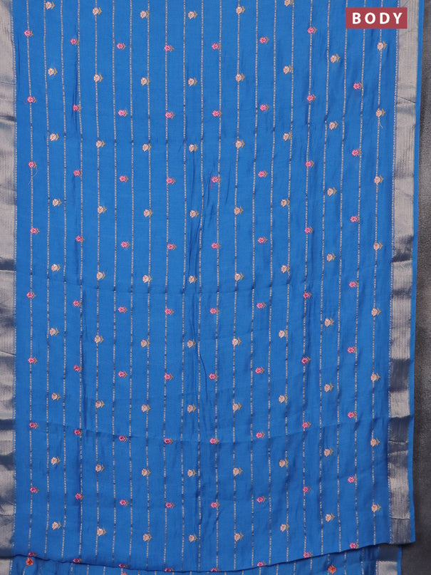 Assam silk saree cs blue with allover zari weaves & embroidery work buttas and zari woven border