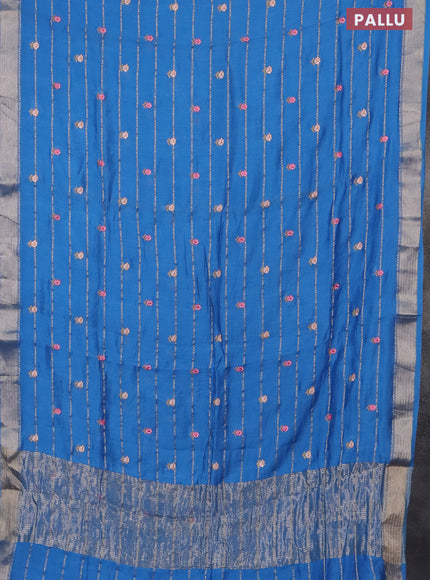 Assam silk saree cs blue with allover zari weaves & embroidery work buttas and zari woven border