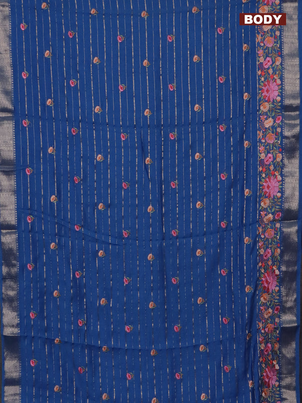 Assam silk saree cs blue with allover zari weaves & floral embroidery work buttas and zari woven border