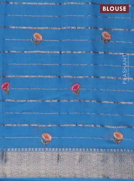 Assam silk saree light blue with allover zari weaves & floral embroidery work buttas and zari woven border