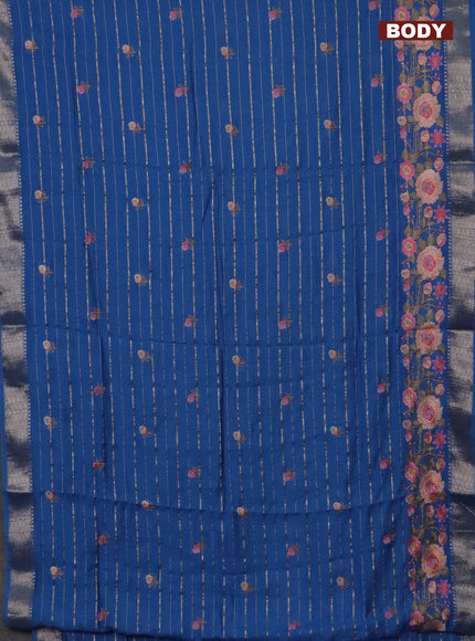 Assam silk saree cs blue with allover zari weaves & floral embroidery work buttas and zari woven border