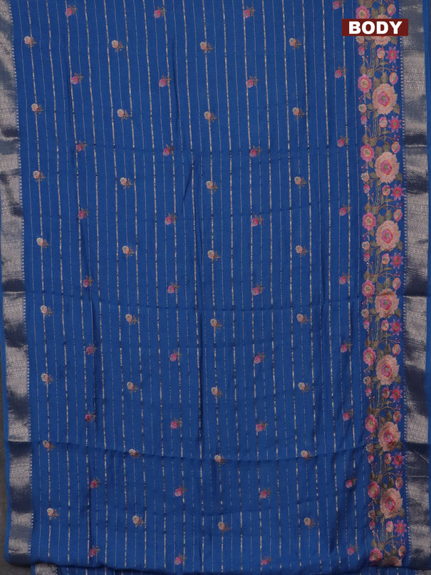 Assam silk saree cs blue with allover zari weaves & floral embroidery work buttas and zari woven border