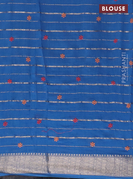 Assam silk saree cs blue with allover zari weaves & floral embroidery work buttas and zari woven border