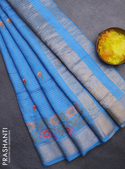Assam silk saree light blue with allover zari weaves & floral embroidery work buttas and zari woven border