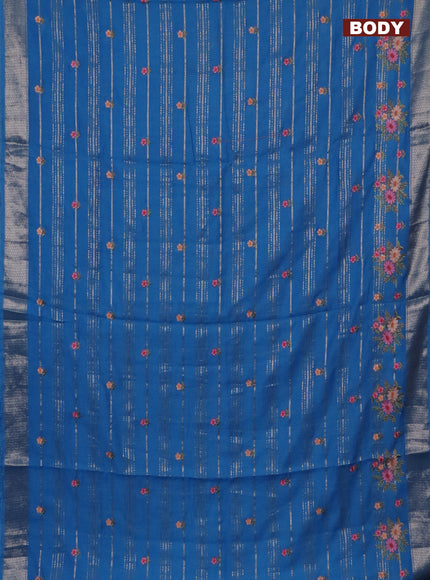 Assam silk saree cs blue with allover zari weaves & floral embroidery work buttas and zari woven border