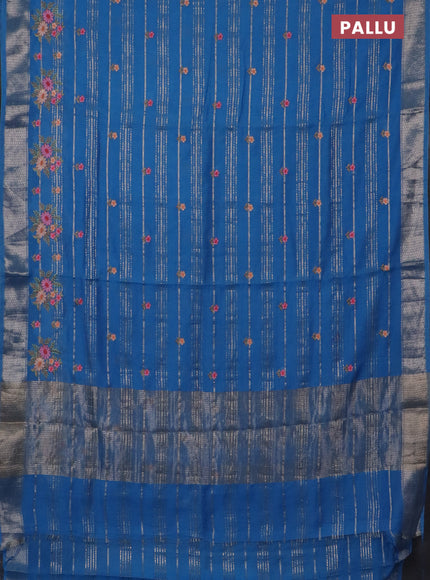 Assam silk saree cs blue with allover zari weaves & floral embroidery work buttas and zari woven border