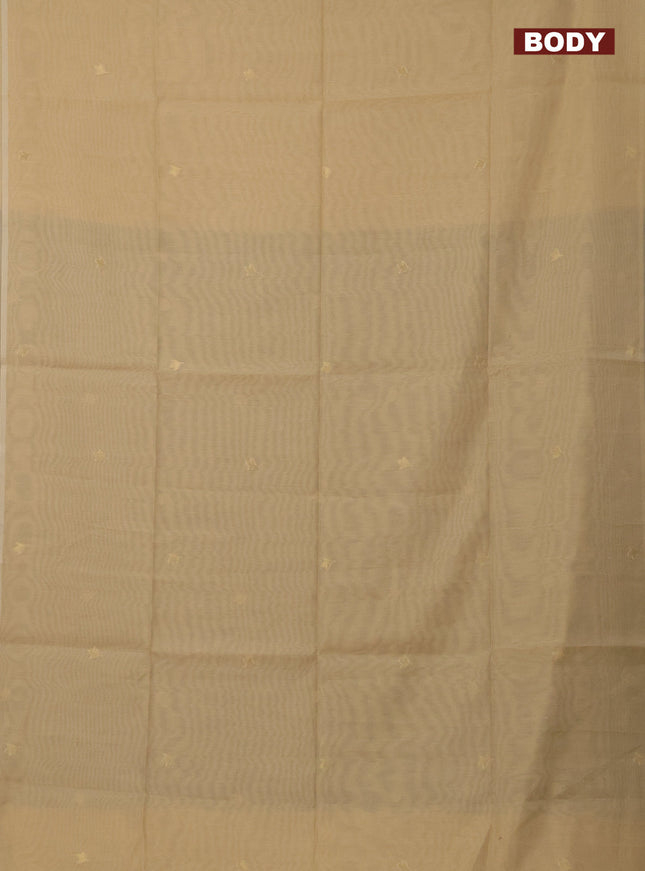 Munga cotton saree sandal and dark grey shade with zari woven buttas in borderless style