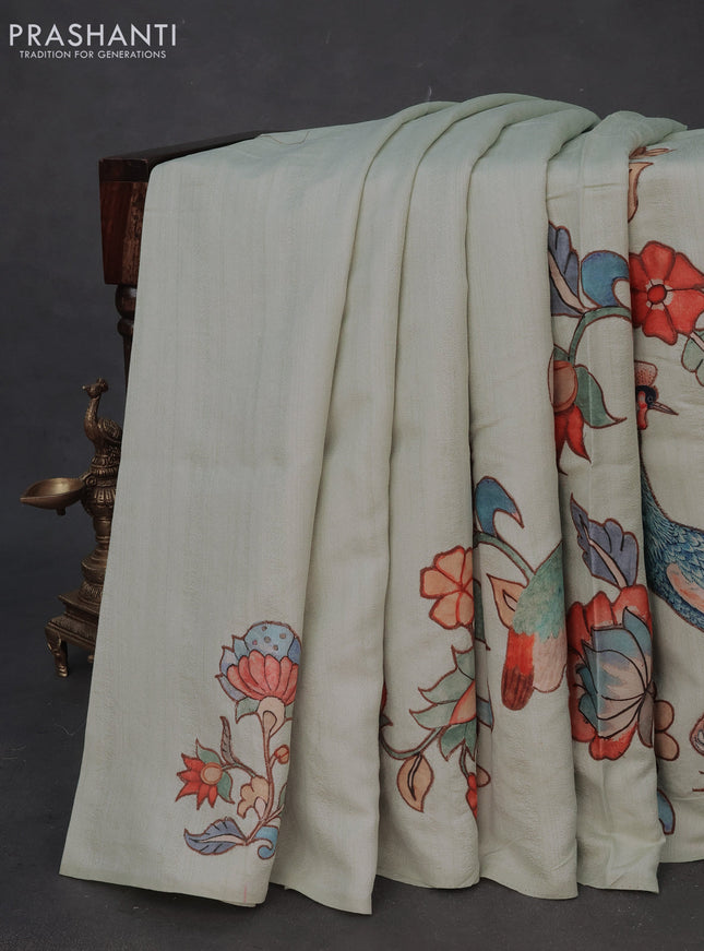 Semi tussar saree pastel green with allover kalamkari applique work in borderless style
