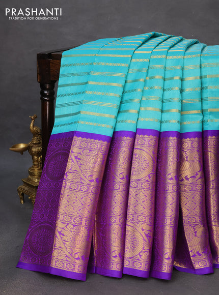 Kuppadam silk cotton saree teal blue and violet shade with allover zari weaves and long zari woven border