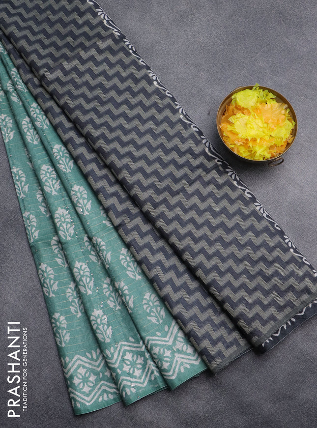 Semi bamboo saree pastel green shade and grey with allover sequin zari stripes & Butta prints and printed border