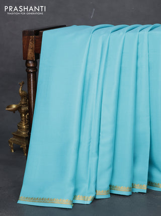 Pure mysore silk saree light blue with plain body and small zari woven border