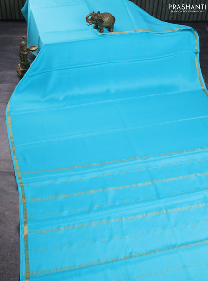 Pure mysore silk saree light blue with plain body and small zari woven border