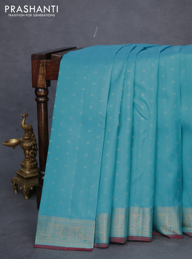 Pure kanchipuram silk saree teal blue and maroon with allover zari woven buttas and zari woven border