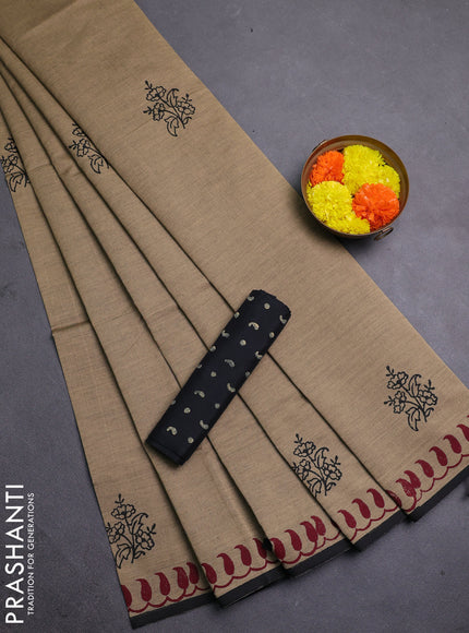 Chiku & Black Semi Silk Cotton Saree - Printed