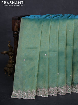 Teal Tissue Silk Embroidery Saree