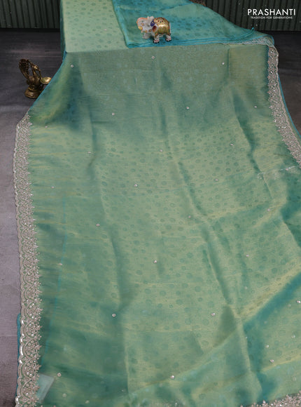 Teal Tissue Silk Embroidery Saree