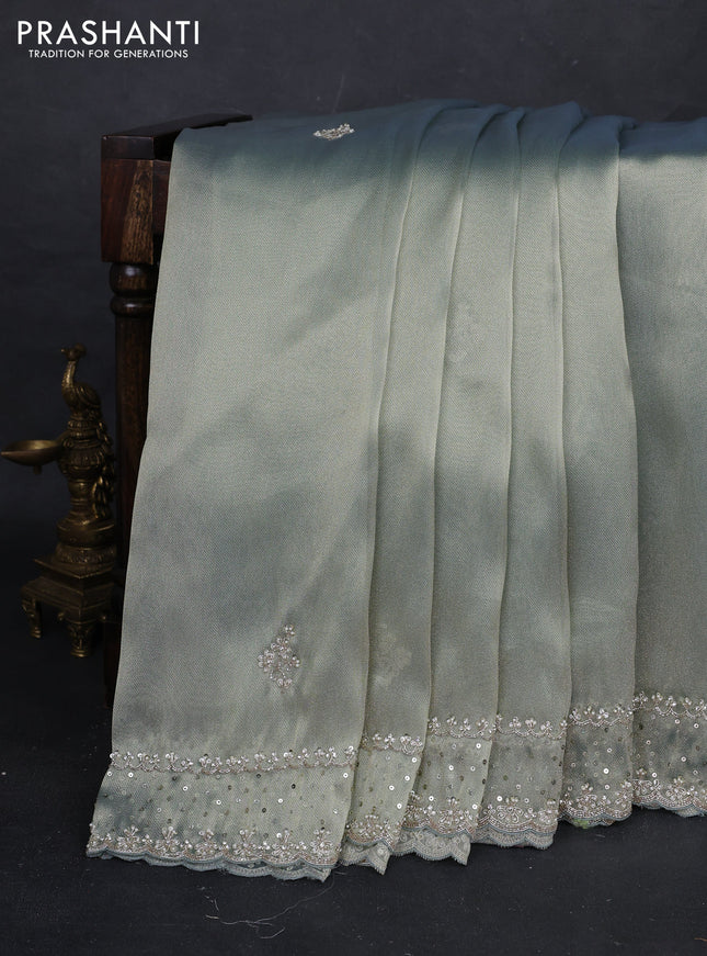 Pastel Green Tissue Silk Embroidery Saree