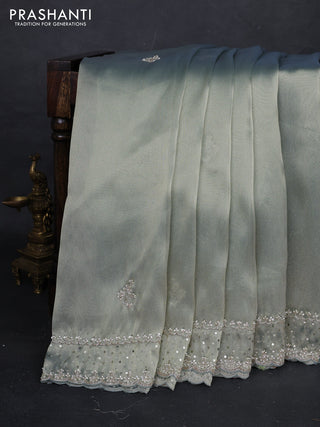 Pastel Green Tissue Silk Embroidery Saree