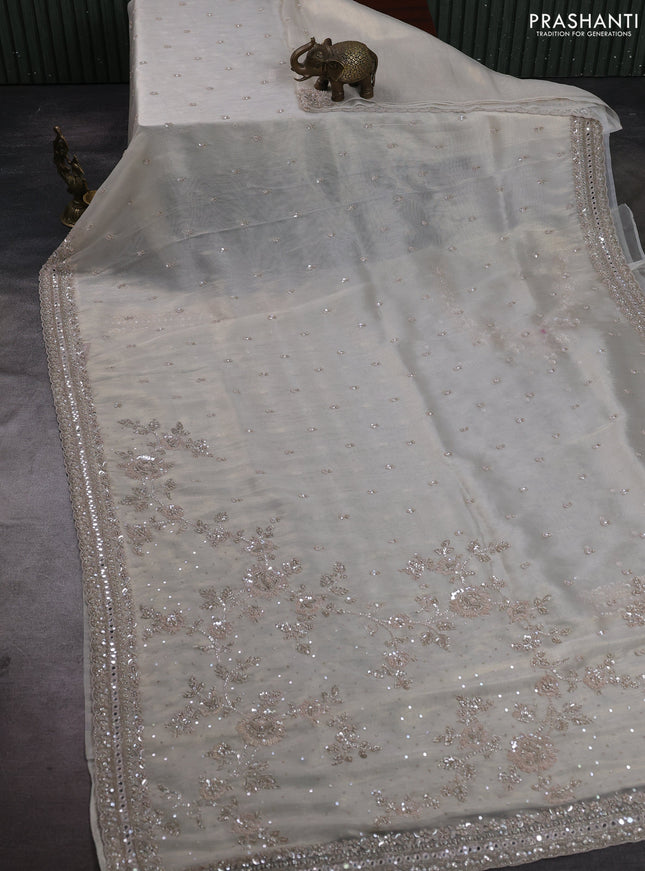 Off white Tissue Silk Embroidery Saree