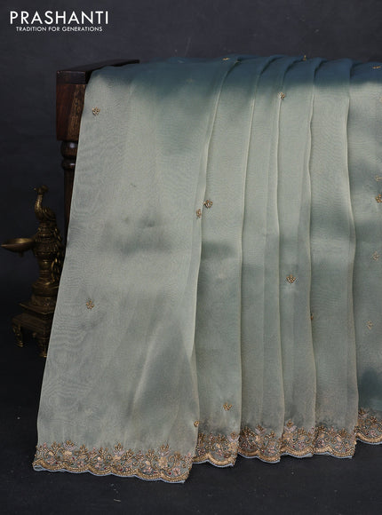 Teal Tissue Silk Embroidery Saree