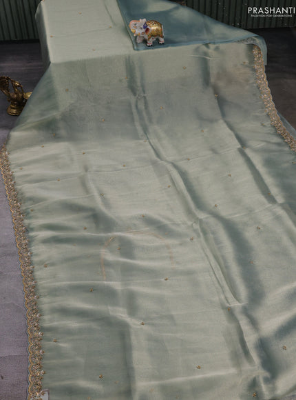 Teal Tissue Silk Embroidery Saree