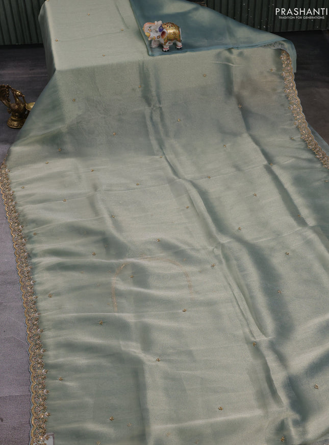 Teal Tissue Silk Embroidery Saree
