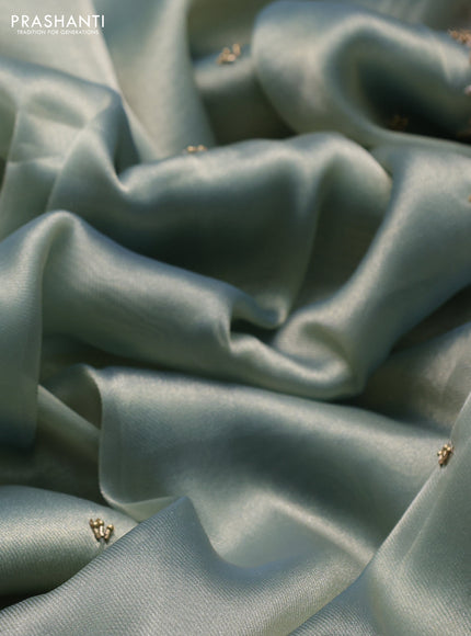 Teal Tissue Silk Embroidery Saree