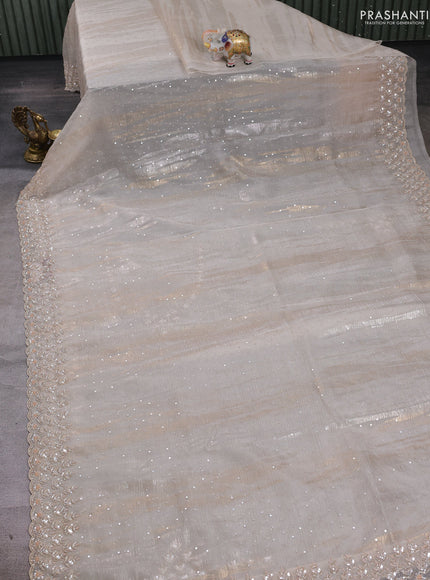 Cream Crushed Tissue Silk Embroidery Saree