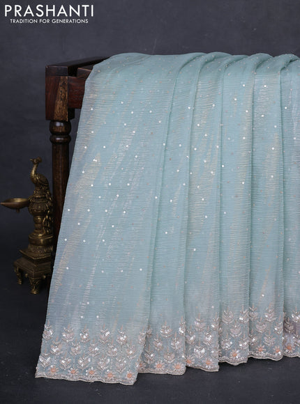 Teal Blue Crushed Tissue Silk Embroidery Saree