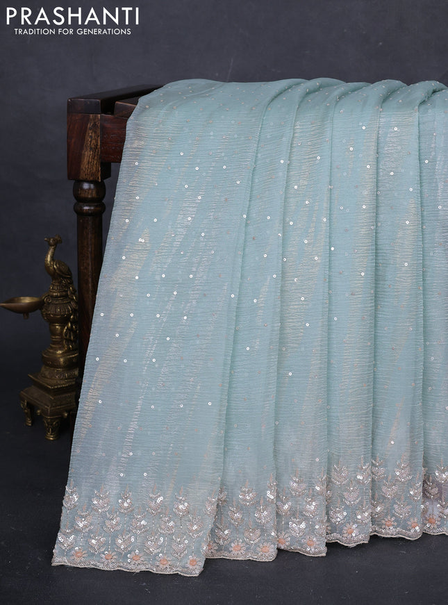Teal Blue Crushed Tissue Silk Embroidery Saree