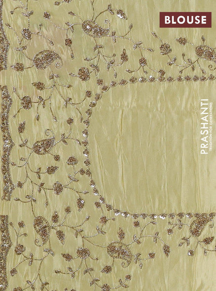 Pale Yellow Tissue Silk Embroidery Saree