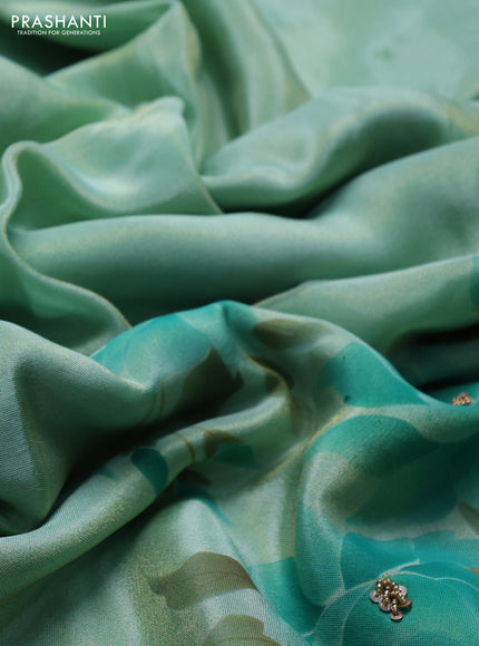 Teal Green Tissue Silk Embroidery Saree