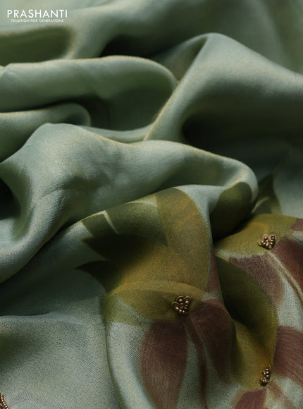 Pastel Green Tissue Silk Embroidery Saree