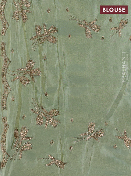 Pastel Green Tissue Silk Embroidery Saree