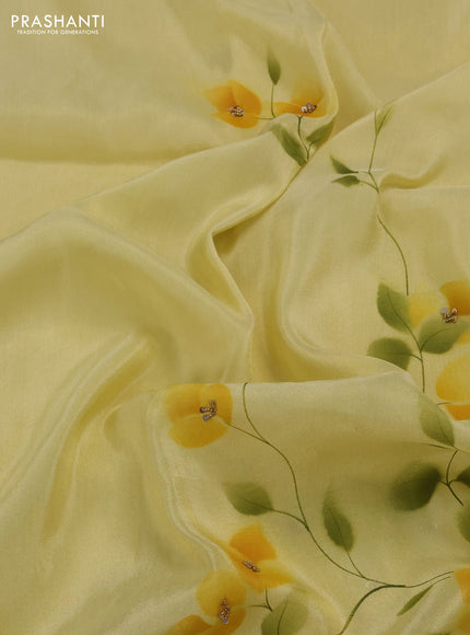 Pale Yellow Tissue Silk Embroidery Saree