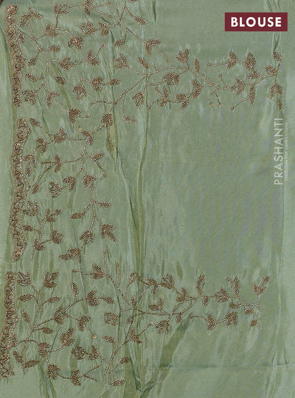 Pastel Green Tissue Silk Embroidery Saree