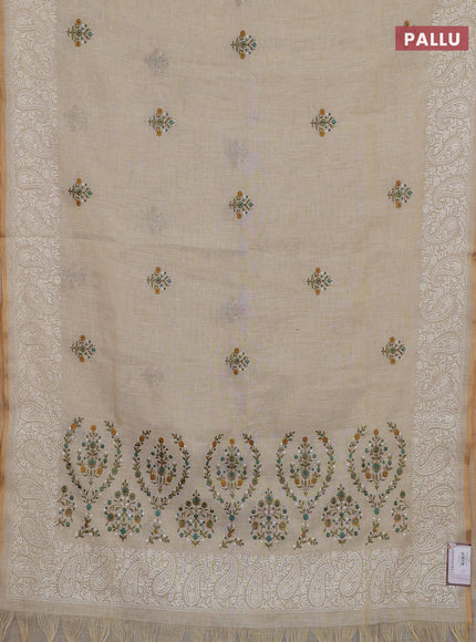 Off White & Teal Green Linen Saree - Embroidery