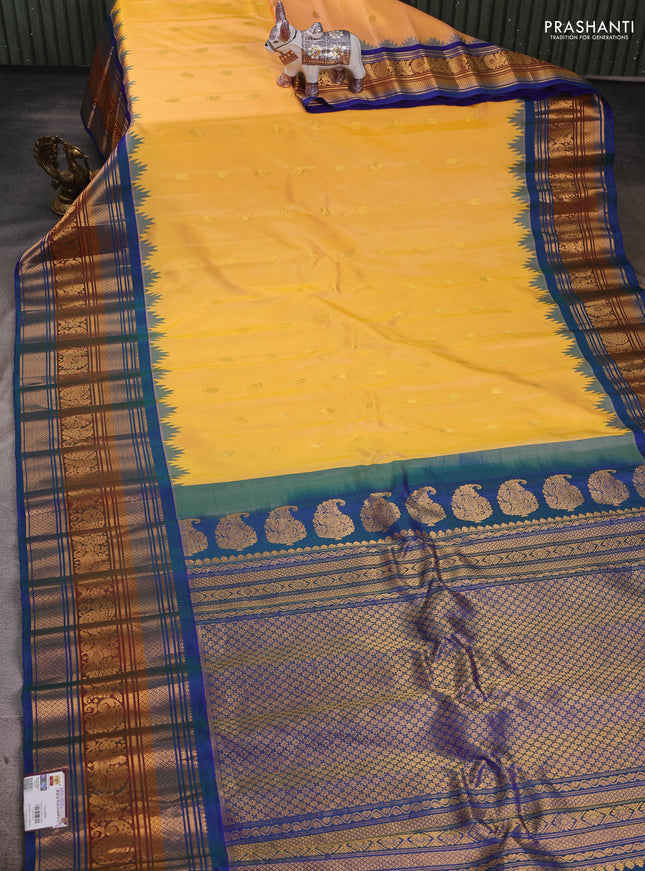 Peach Orange & Peacock Blue Pure Gadwal Silk - Buttas