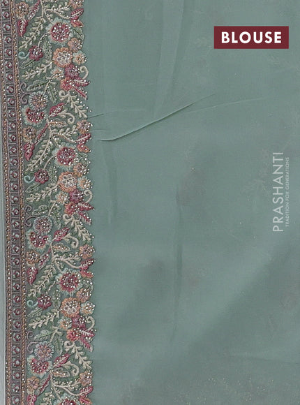 Pastel Green Georgette Saree - Embroidery