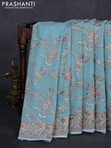 Aque Blue Georgette Saree - Embroidery