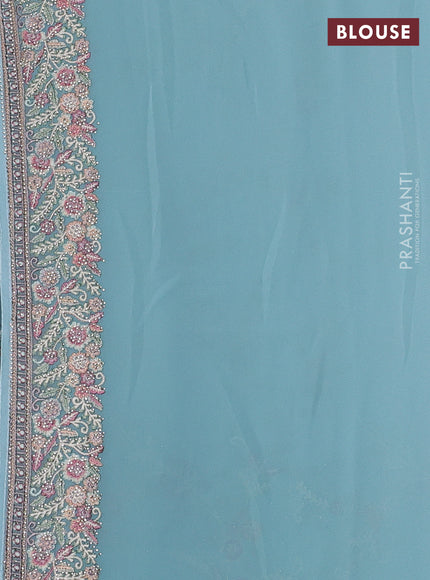 Aque Blue Georgette Saree - Embroidery