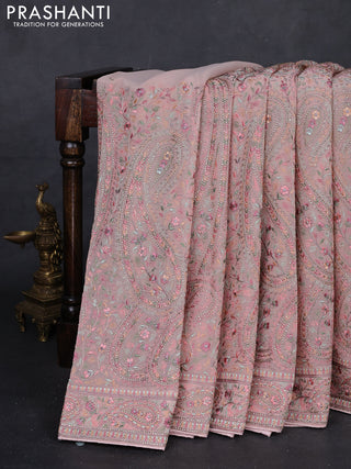 Pastel Peach Georgette Saree - Embroidery