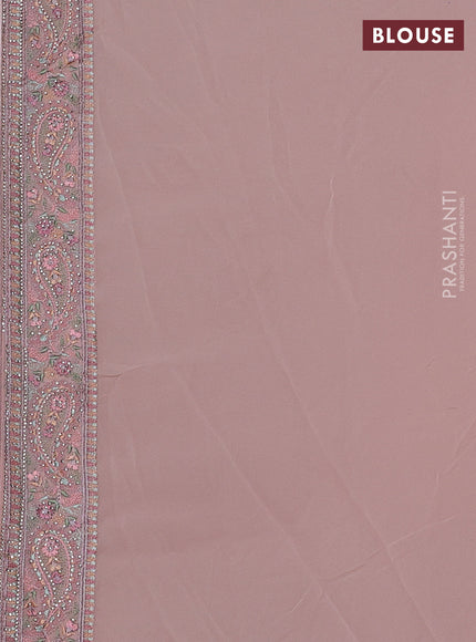 Pastel Peach Georgette Saree - Embroidery