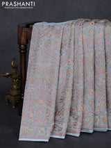 Aque Blue Georgette Saree - Embroidery