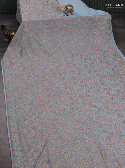 Aque Blue Georgette Saree - Embroidery