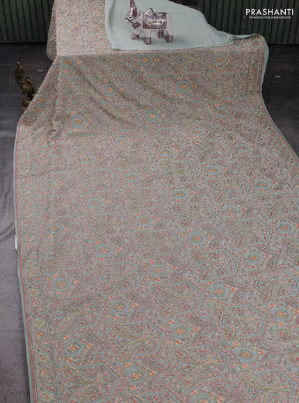 Pastel Green Georgette Saree - Embroidery