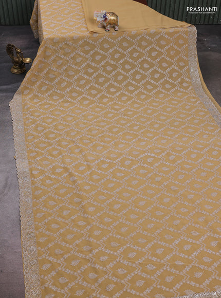 Sandal Georgette Saree - Embroidery