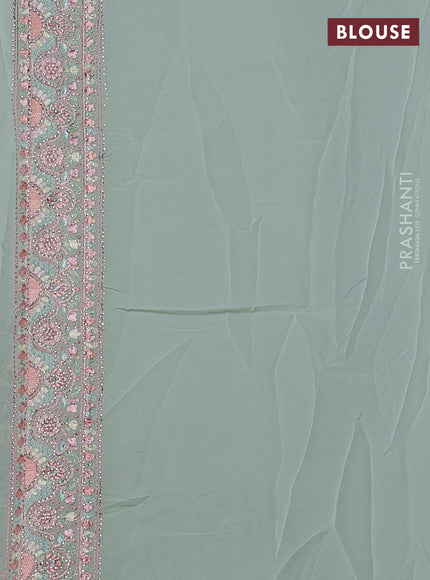 Pastel Green Georgette Saree - Embroidery